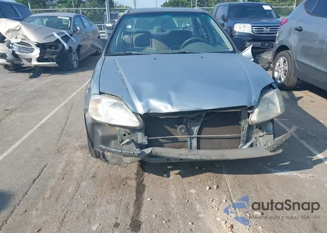 1999 Honda Civic Lx z USA, uszkodzony, nr VIN 2HGEJ6670XH566953